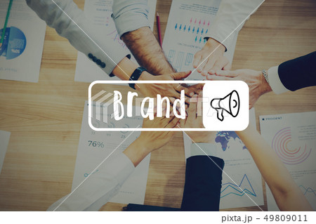 Group of business people with hands together on desk - Brand Group of business people with hands together on desk - Brand 49809011