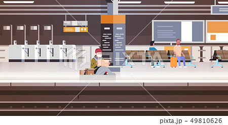 poor man with sitting on floor railway station begging for help beggar guy holding sign board 49810626