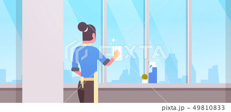 woman in gloves and apron cleaning windows with rag cleaner spray rear view housewife doing woman in gloves and apron cleaning windows with rag cleaner spray rear view housewife doing 49810833