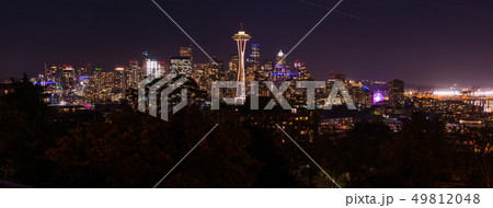 Panoramic night view of the Seattle skyline with the Space Needle and other iconic buildings in the Panoramic night view of the Seattle skyline with the Space Needle and other iconic buildings in the 49812048