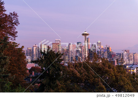 Sunset over the skyline of the city of Seattle and the profile of Mount Rainier in the background. Sunset over the skyline of the city of Seattle and the profile of Mount Rainier in the background. 49812049