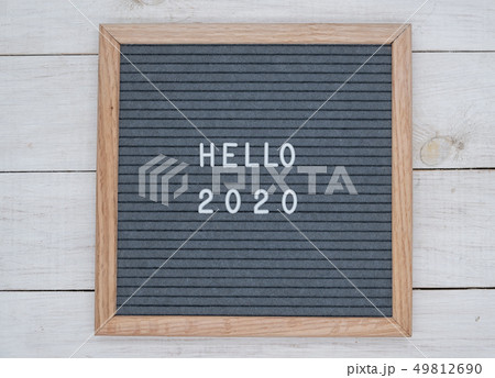 English text Hello 2020 on a letter Board in white 49812690