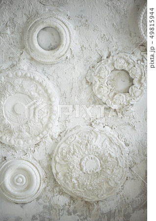 Stucco on a white wall with old plaster.Texture 49815944