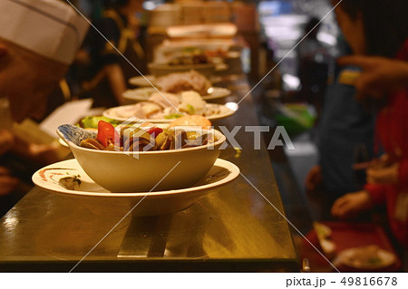 fried scallop and clam in bowl on counter fried scallop and clam in bowl on counter 49816678