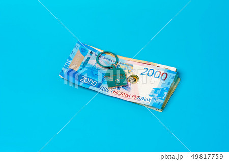 Keychain on the background of russian ruble banknotes Keychain on the background of russian ruble banknotes 49817759