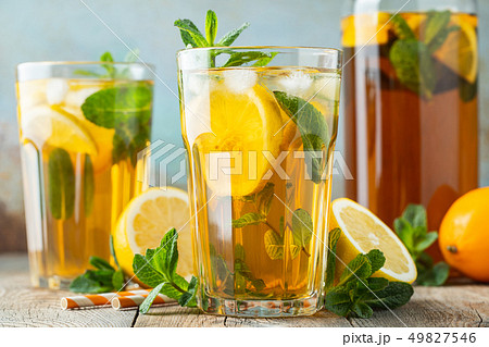 Iced tea with lemon and ice in tall glasses. 49827546