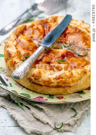 Traditional French closed pie with potatoes. 49829760