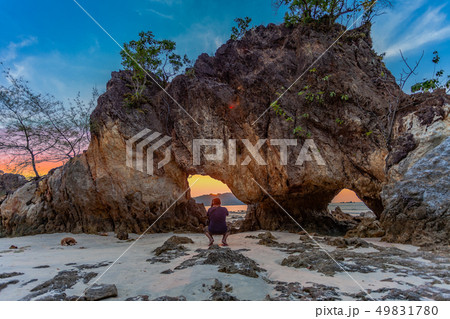 tourists like to take a picture in the hole of 49831780
