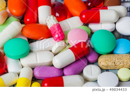 Pills and money - business medical background 49834433