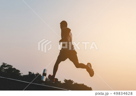 runner running on running road in city runner running on running road in city 49834628