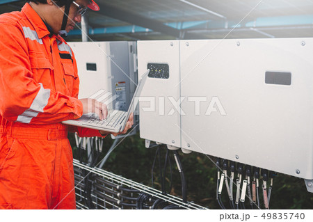 engineer in solar power plant  49835740