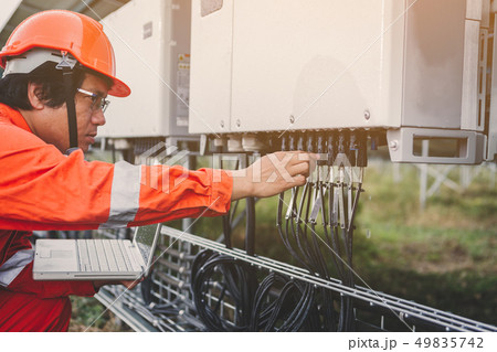 engineer in solar power plant  49835742