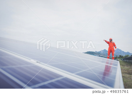 engineer in solar power plant  49835761