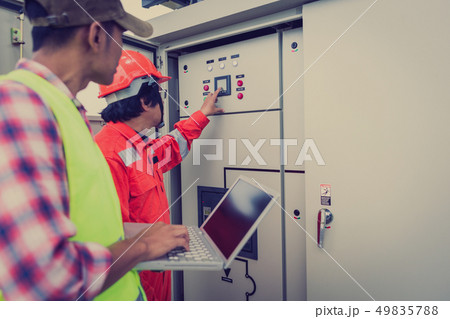 engineer in solar power plant  49835788