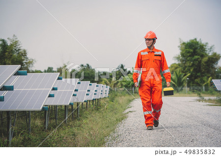 engineer in solar power plant  49835832