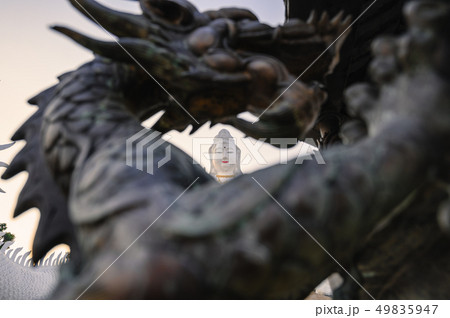 Statue guanyin through sculpture dragon 49835947