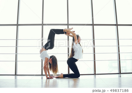 Beautiful and elegant girls doing yoga 49837186