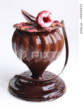 Glass shaped dessert with rose petals and Glass shaped dessert with rose petals and 49840833