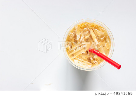 Top view of glass of iced coffee on white 49841369