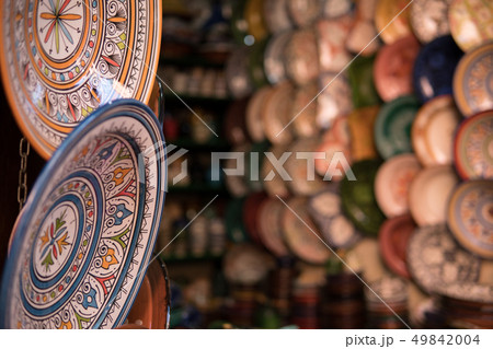 Traditional ceramic pottery on the wall of Morocco bazaar, Marakesh 49842004