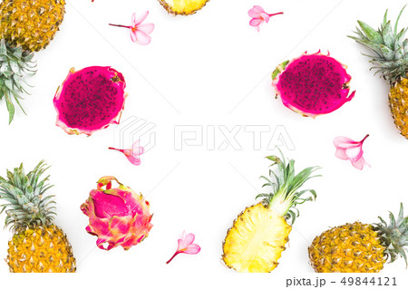 Tropical frame of pineapple and dragon fruits 49844121