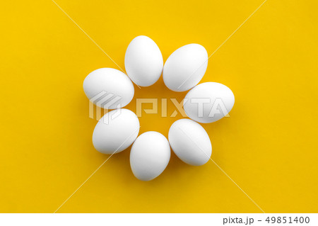 White chicken eggs lie in the form of a flower on White chicken eggs lie in the form of a flower on 49851400