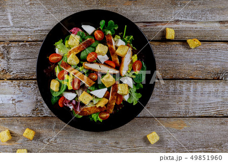 Fresh salad with chicken breast, arugula Fresh salad with chicken breast, arugula 49851960