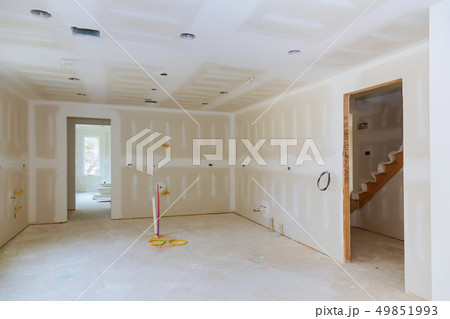 Drywall is hung in kitchen room remodeling project Drywall is hung in kitchen room remodeling project 49851993