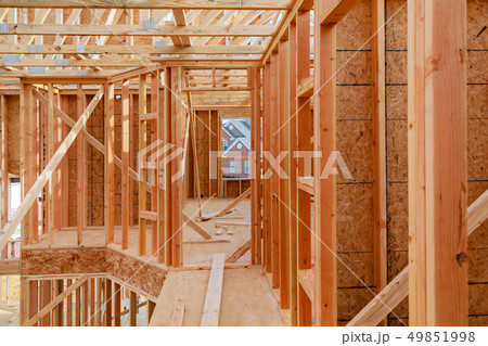 Wood building frame structure on a new development 49851998