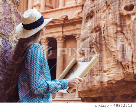 Woman exploring the sights city of Petra Woman exploring the sights city of Petra 49852512