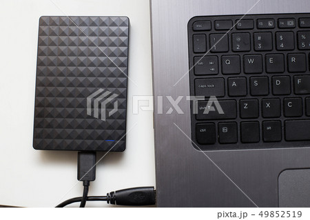 External hard drive connect to laptop computer, transfer or backup data between laptop and hard disk 49852519