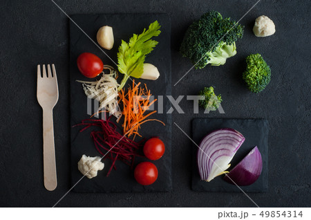 Food background with raw organic vegetables 49854314