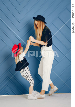 Mother and daughter  49854914