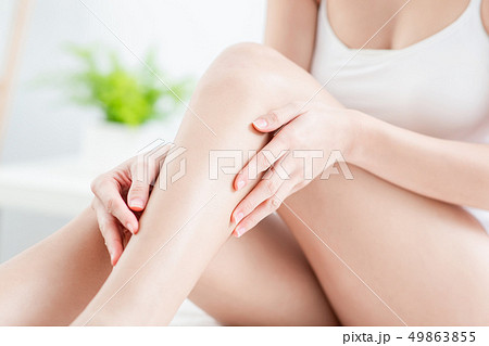 woman touching perfect shaved legs woman touching perfect shaved legs 49863855