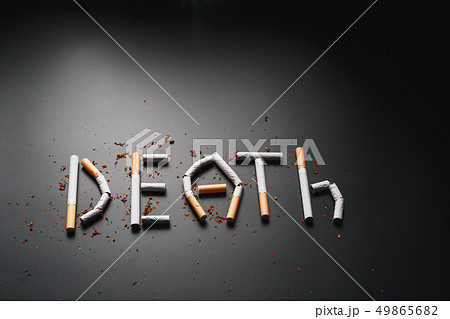 The inscription DEATH from cigarettes on a black The inscription DEATH from cigarettes on a black 49865682