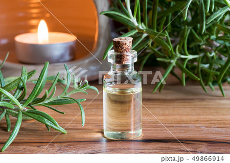 A bottle of rosemary essential oil  49866914