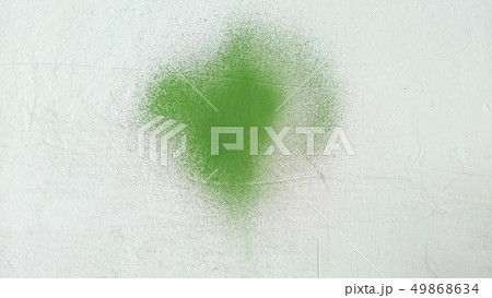 Green paint stain on grunge cement texture. Old Green paint stain on grunge cement texture. Old 49868634