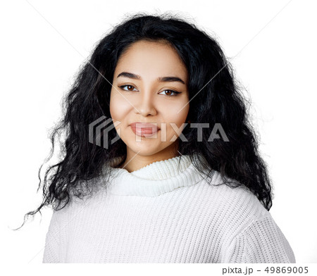 Young woman with curly black hair. 49869005