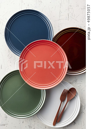 Tableware, plates and cutlery on wooden table 49875057