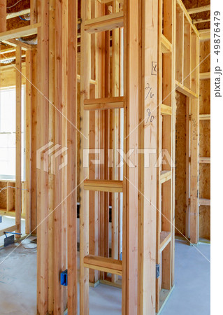 Interior framing beam of new house under 49876479