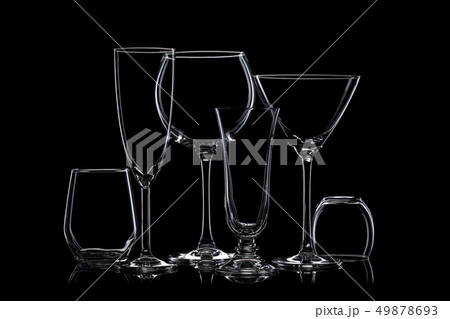 Glassware silhouettes on black. 49878693