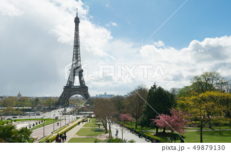 view of Eiffel Tower from Trocadero against a cloudy sky 49879130
