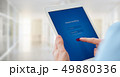 Male hands holds a tablet with online banking 49880336
