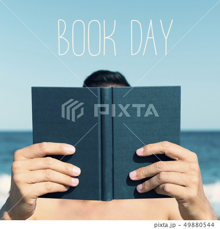 man reading a book and text book day man reading a book and text book day 49880544
