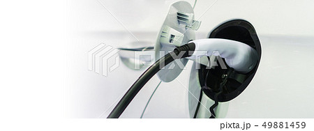 Electric car charging on charge station, Transport Electric car charging on charge station, Transport 49881459