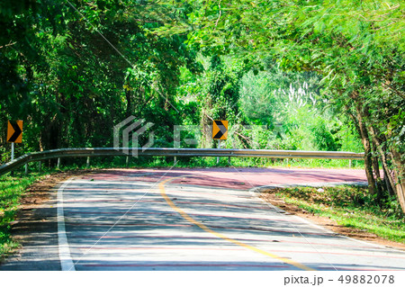 A dangerous curve on a roadway in which drivers A dangerous curve on a roadway in which drivers 49882078