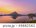 Mountains reflecting water before sunrise 49882562