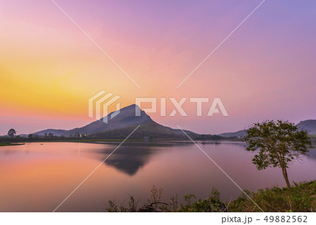 Mountains reflecting water before sunrise 49882562