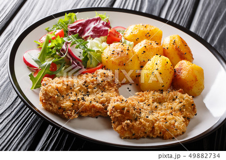 Main course fried steaks in sesame breaded with Main course fried steaks in sesame breaded with 49882734