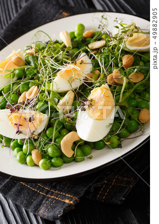 Spring salad of green peas, micro green, nuts and 49882905